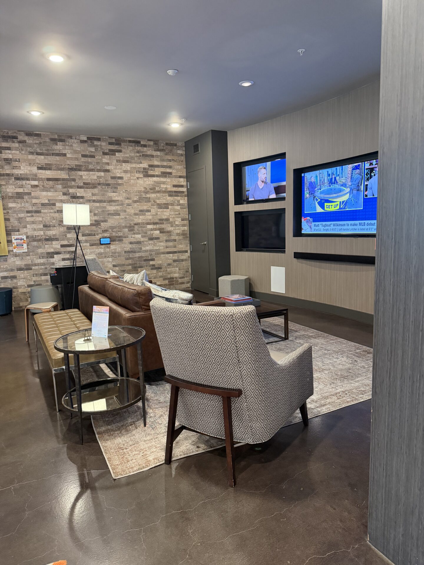 CURED Club Room with TVs for meetings and presentations